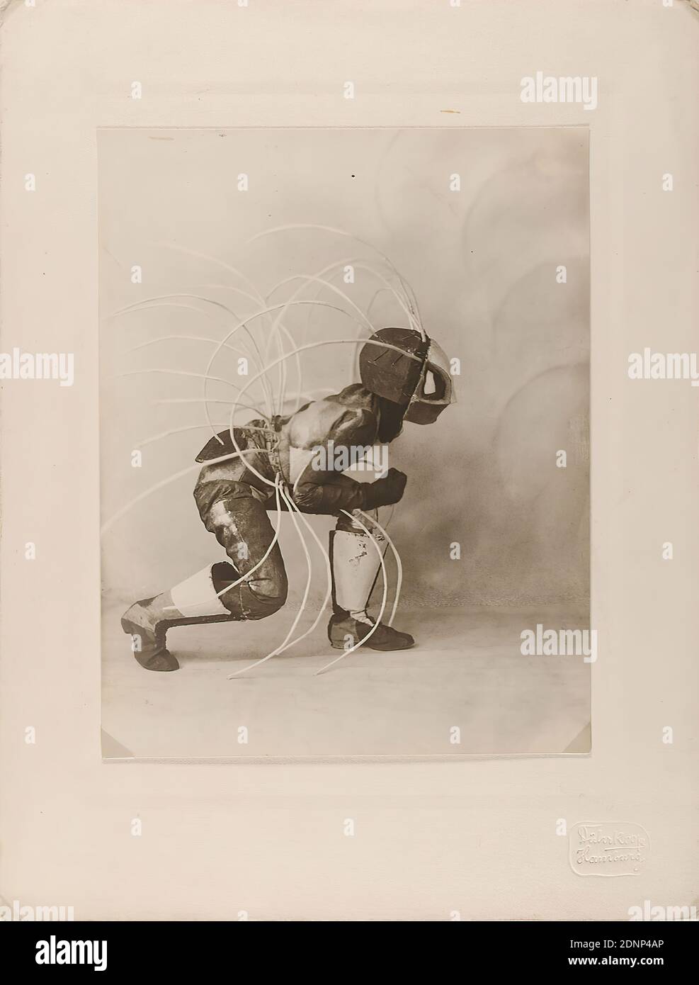 Minya Diez-Dührkoop, dance mask Toboggan Frau by Lavinia Schulz, silver gelatin paper, black and white positive process, picture size: height: 21,40 cm; width: 16,70 cm, dry stamp: recto u. r. on the cardboard: Dührkoop, Hamburg, inscribed: recto u. on the cardboard handwritten in lead, old and new inv.no, Repro No, Toboggan; on verso and handwritten in lead: old inv. no, repro no, dimensions, signed: recto and left: hardly visible, handwriting Dührkoop copied into the picture, theater photography, dancing Stock Photo