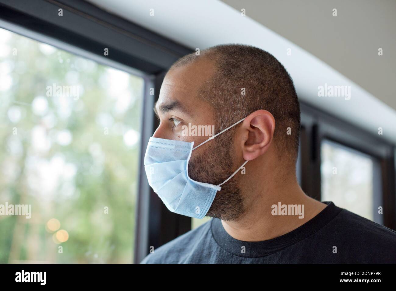 Man wearing protective mask Stock Photo