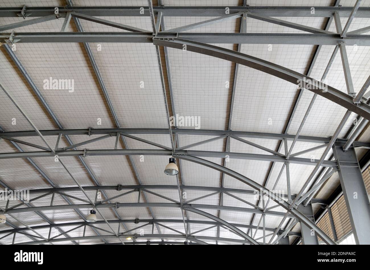 Metal Roof Frame or Roof Structure of Indoor Stadium Building with Metal Beams and Trusses Stock Photo