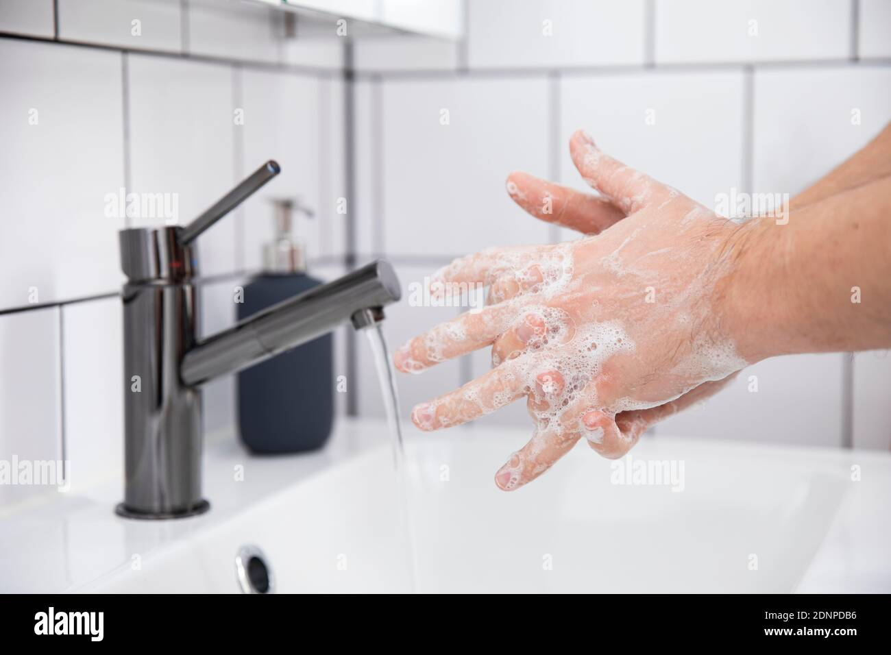 Close-up of person washing hands Stock Photo