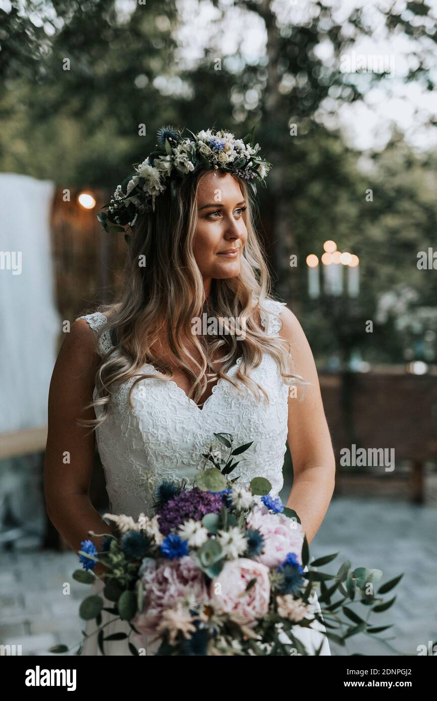 Smiling bride looking away Stock Photo