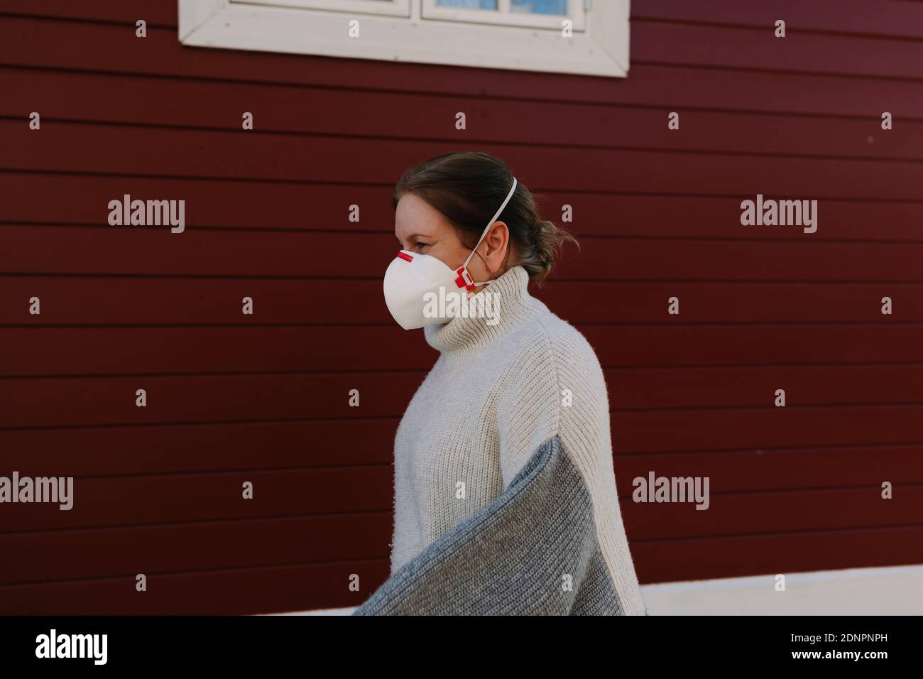 Woman wearing face mask side hi-res stock photography and images - Alamy
