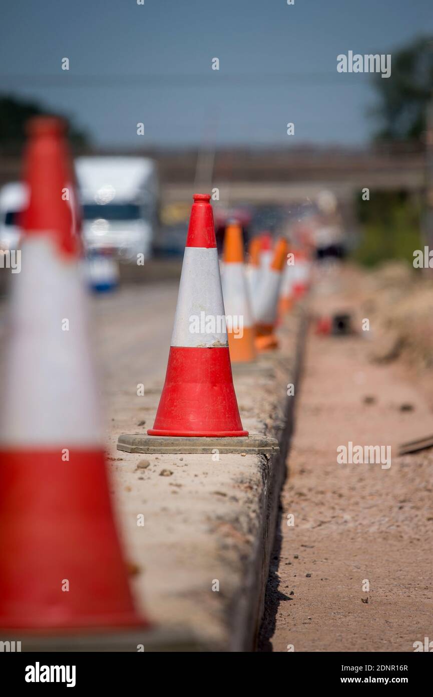 Traffic cones in roadworks on the M1 motorway in England. Stock Photo