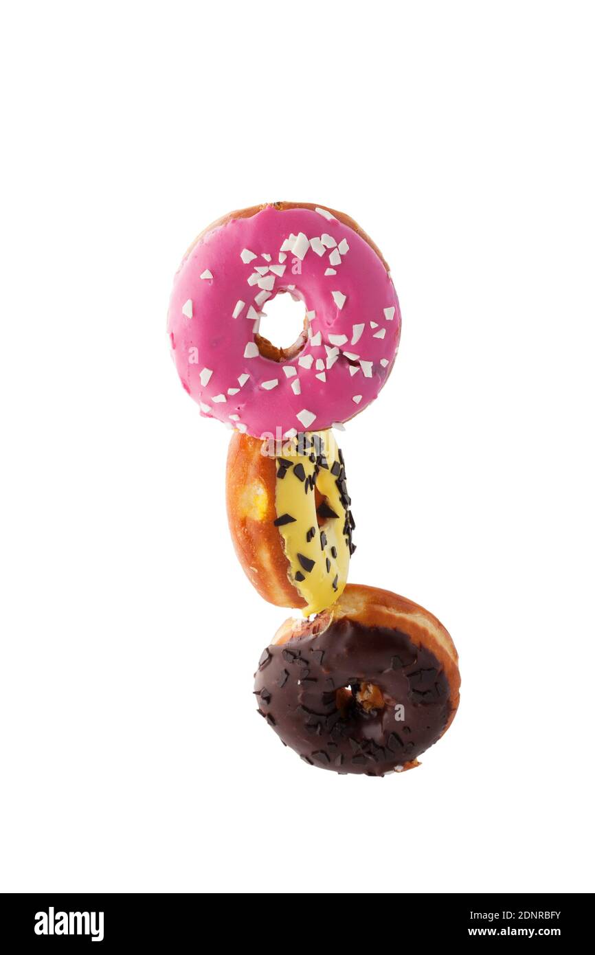 Stop motion donuts on a white background. Glazed donuts stack. Stock Photo