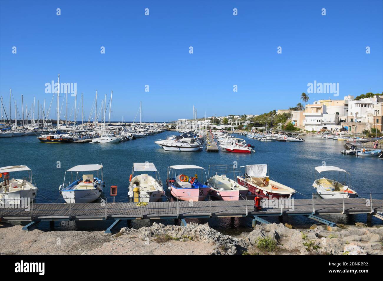 Boats Moored In Harbor Stock Photo