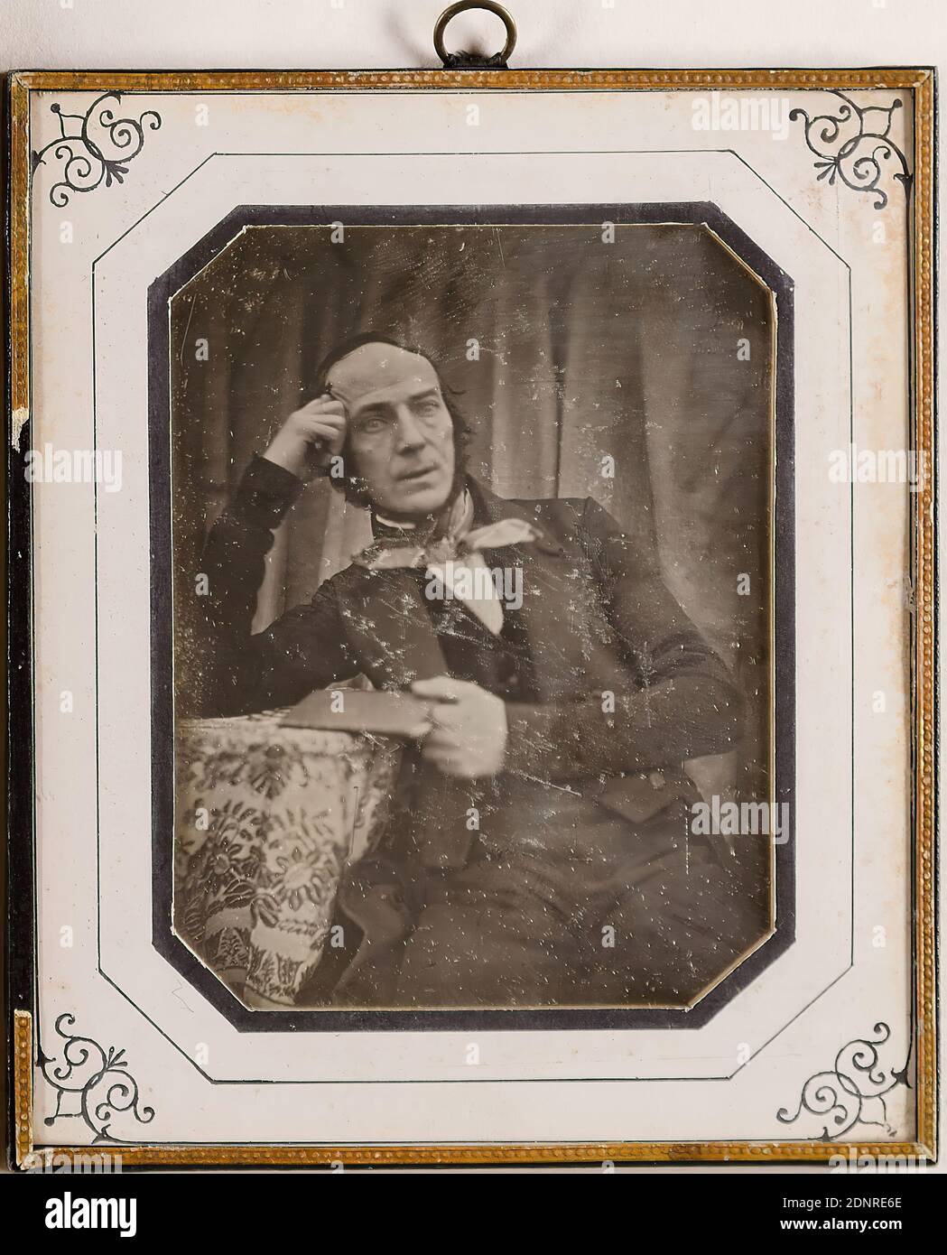 Ludwig Schultz, man, Daguerreotype, Image Size: Height: 9,30 cm; Width: 7,10 cm, Label: verso: title, photographer, portrait photography, man, sitting figure, half-length portrait, arm positions, gestures Stock Photo