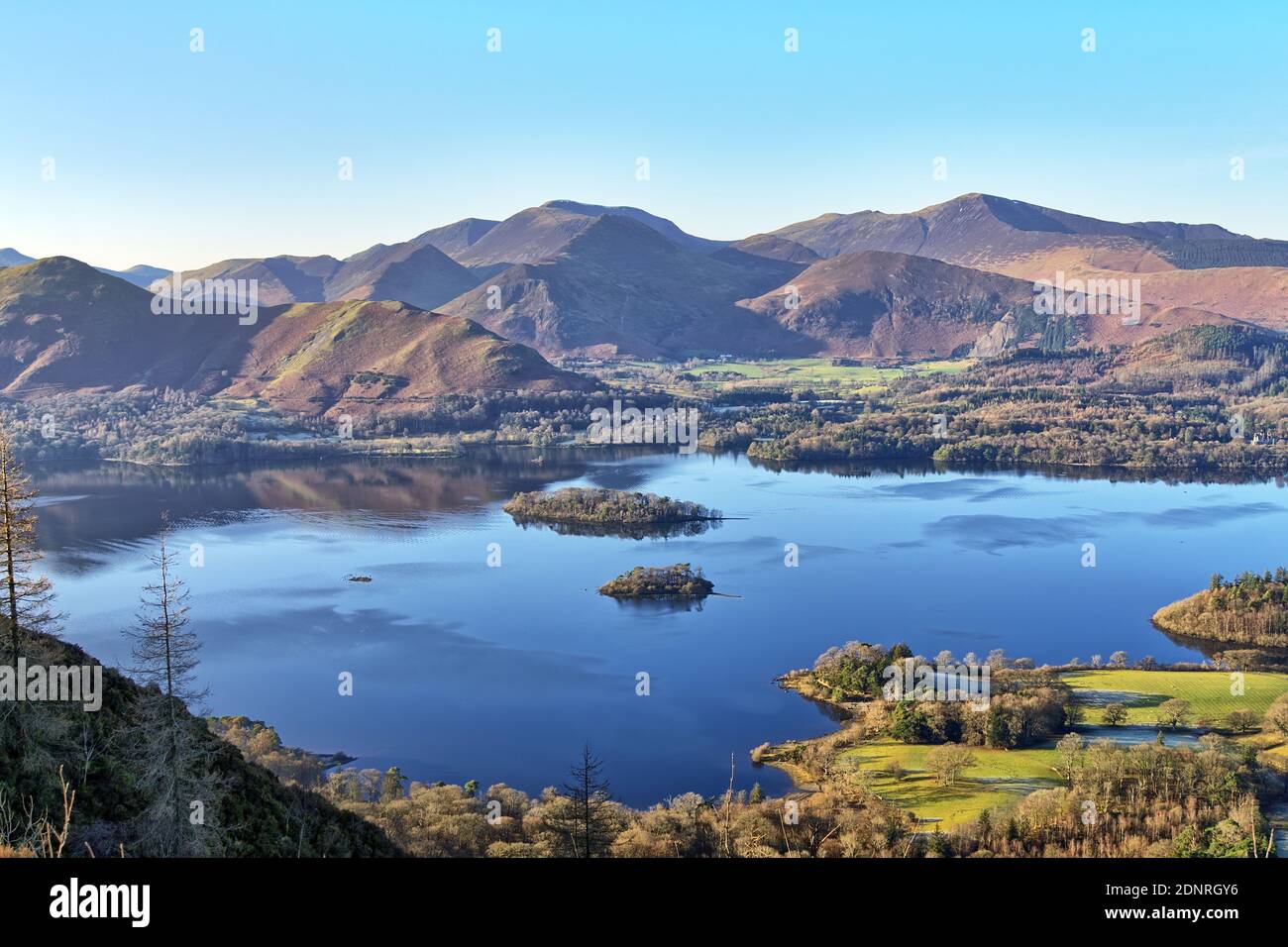 A view of Derwentwater and the Coledale Horeshoe from Walla Crag on a sunny winters day Stock Photo