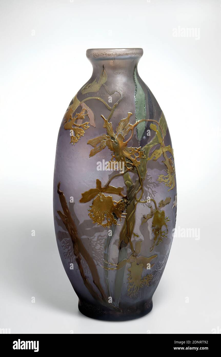 Emile Gallé, Vase Les Lumineuses with a verse by Victor Hugo, glass, overlaid, etched, cut, Total: Height: 43.00 cm; Width: 20.50 cm, inscribed: On the wall: in high etching: Gallé, ornamental objects, Art Nouveau, The study of East Asian glass art inspired the French artist Emile Gallé to produce flashed glass, which today is one of the most beautiful and important glass works of art nouveau. As decoration, the studied botanist chose mainly motifs from the plant world and thus promoted the rich floral ornamentation, which as a whole is characteristic of French Art Nouveau. Stock Photo