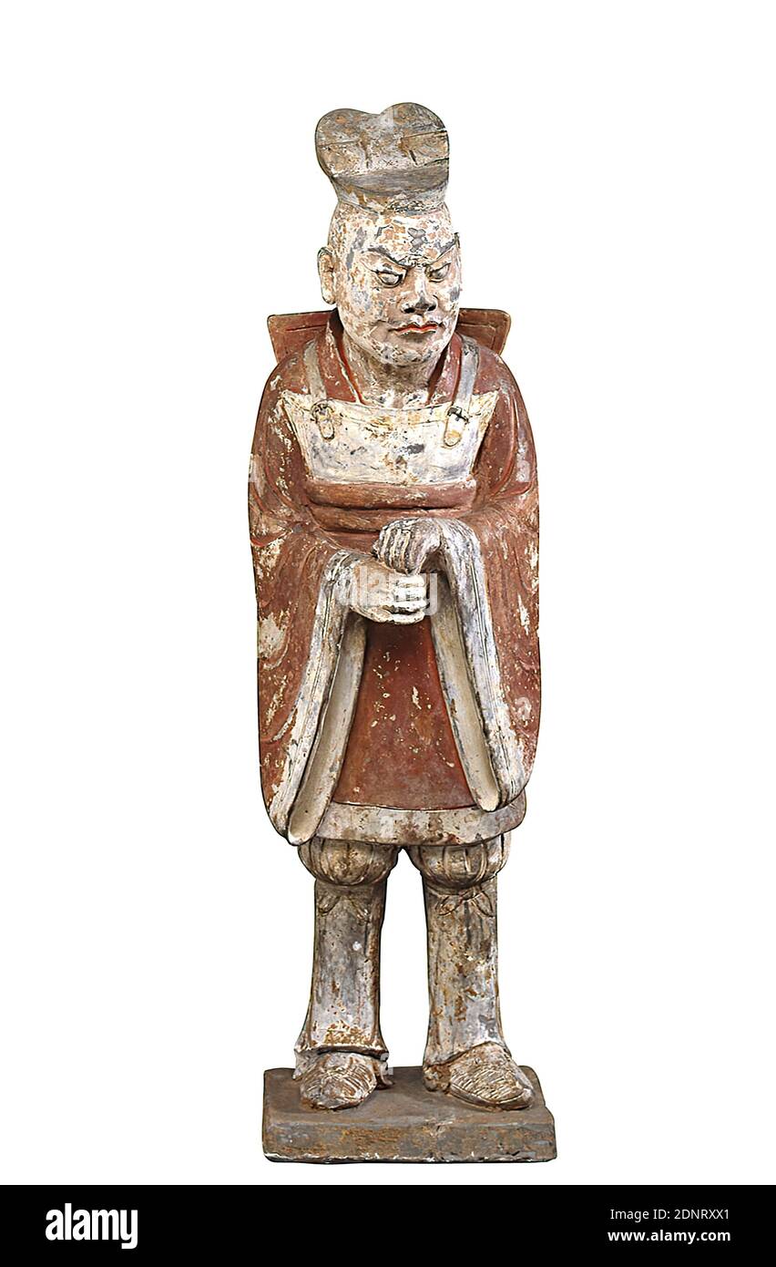 Grave figure of a military officer, earthenware, painted (ceramic), Total: Height: 64,50 cm, ceramic, sculptures, grave equipment, man, Northern Wei Dynasty, The dead were buried in China with the things and figures that surrounded them during their lifetime. They should also ensure them a corresponding continuation of life in the hereafter. The grave goods therefore give us a good picture of the respective time. Grave figures like these of military or civil officials were usually given to high dignitaries as a pair in the grave. Stock Photo