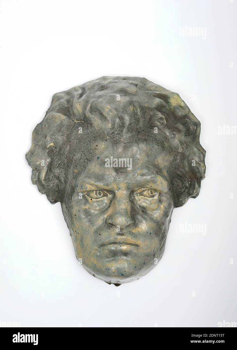 Niels Hansen-Jacobsen, self-portrait mask, Acquired by the artist at the world exhibition in Paris in 1900, stoneware, glazed, Total: Height: 32,20 cm; Width: 27,80 cm; Depth: 9,40 cm, monogrammed, inscribed and dated: on the reverse: Hans. Jacobsen, and ligated: NHJ 97. next to the initials a lettering that has become incomplete and illegible due to the break, sculptures, sculptures, self-portrait, artist, head picture, portrait, self-portrait of a sculptor, art nouveau Stock Photo