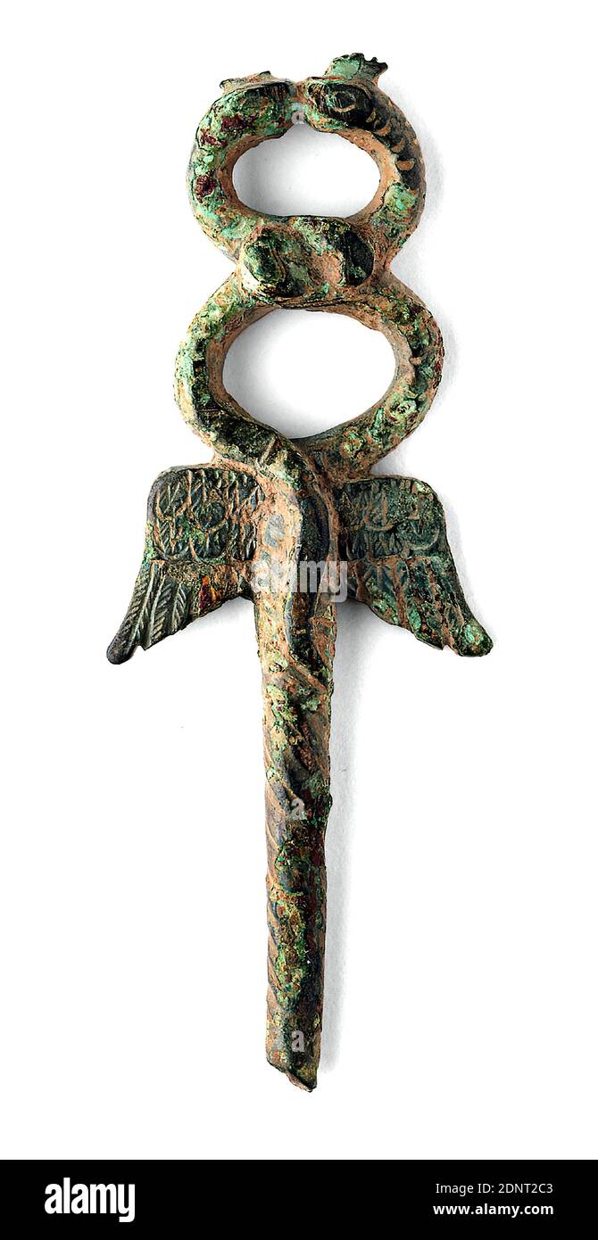 Herald's staff (Caduceus, Kerykeion), bronze, cast, engraved, hallmarked, bronze, Total: Height: 8.6 cm; Width: 2.2 cm, Rituals and ceremonies, votive gifts, snakes, bird feathers, Early Imperial period, Roman antiquity, In this small-format Kerykeion the shaft is turned, the back slightly flattened and little worked out. The upper section is flanked by two wings decorated with three rows of carefully engraved feathers. The snake bodies are scaled and knotted together at the crossing. The tail of one snake rests on the upper base of the stick shaft. Stock Photo