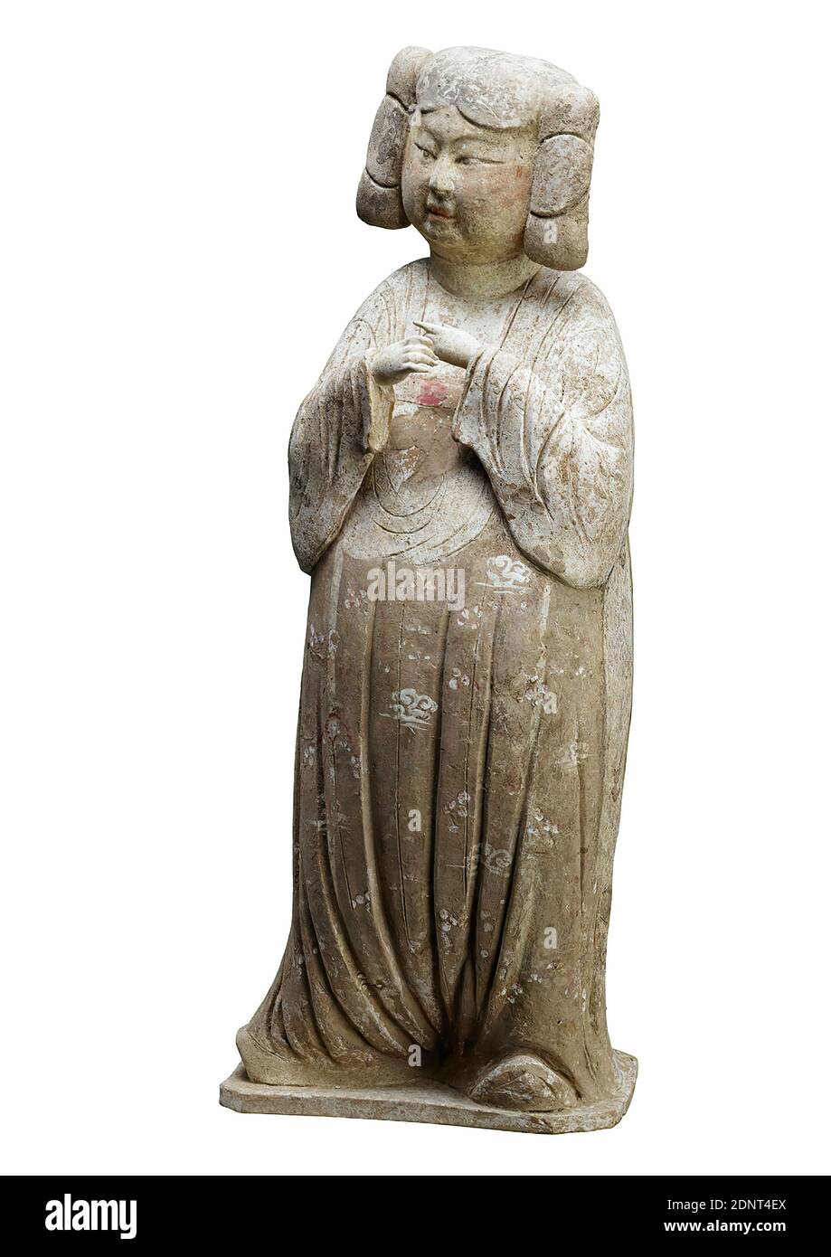 Grave figure of a court lady, Earthenware, painted (ceramic), Total: Height: 64.50 cm; Width: 25.00 cm; Height: 19.00 cm, Grave goods, Woman, Royal Court; Courtiers, entourage, Tang Dynasty, The two court ladies come from a grave of the 8th century. This period represents the peak of grave sculpture in China. According to Chinese belief, the spirit of the deceased lived on. Therefore, the grave furnishings had to ensure that he would be able to stay in the afterlife in a manner befitting his status. The two ladies embody the ideal of beauty of their time in their chubbiness. Stock Photo