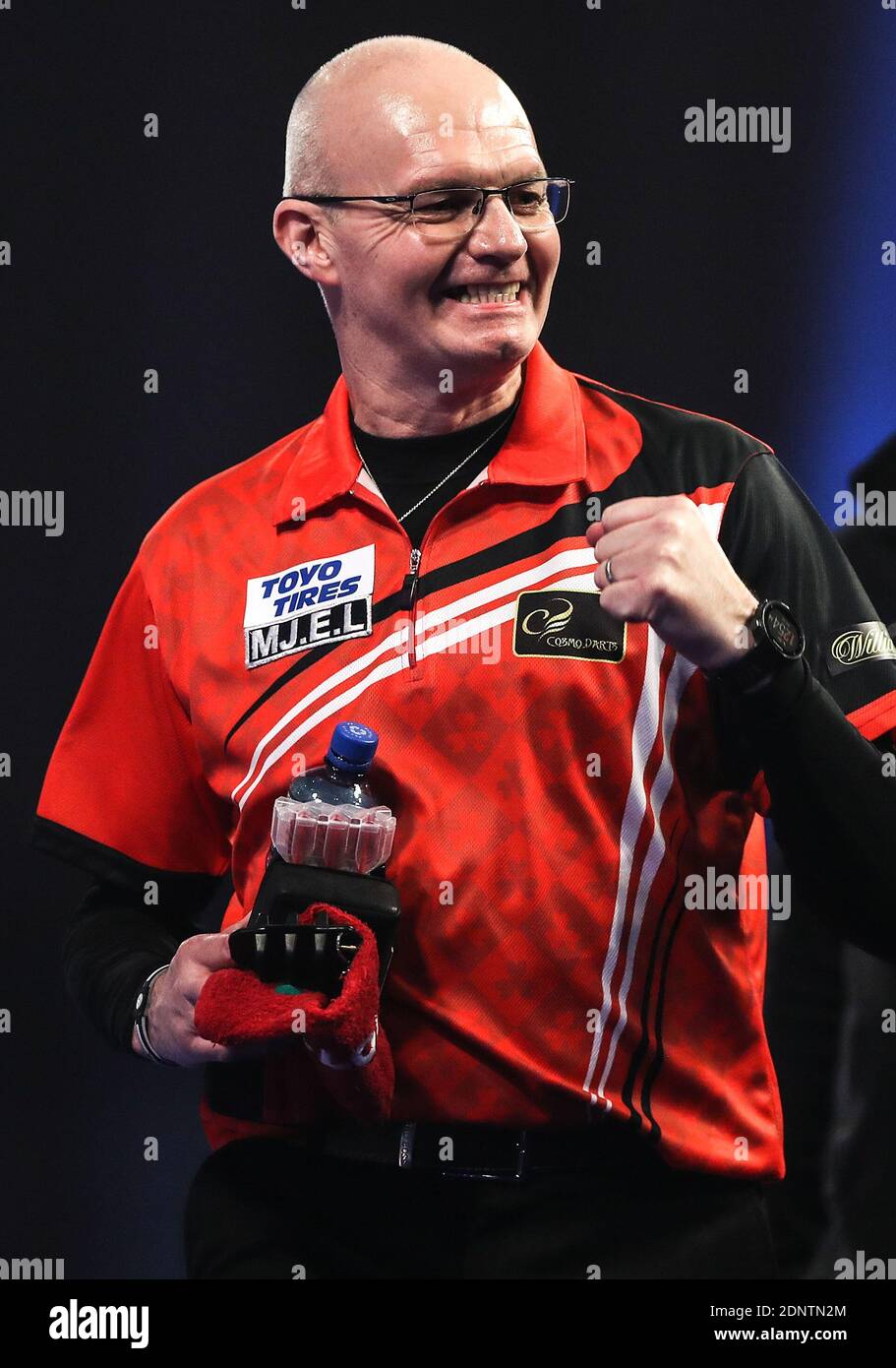 Mickey Mansell celebrates after winning his match during day four of the  William Hill World Darts Championship at Alexandra Palace, London Stock  Photo - Alamy