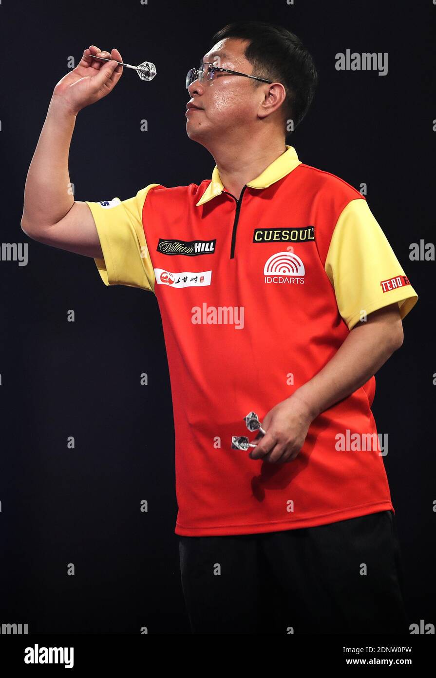 Changan Liu in action during day four of the William Hill World Darts  Championship at Alexandra Palace, London Stock Photo - Alamy