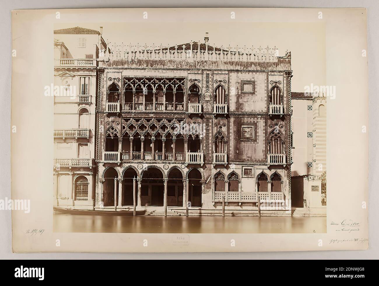 Carlo Naya, Venezia - Ca' d'Oro, 1892. Albumin paper, black and white positive process, sheet size: height: 26.50 cm; width: 35.00 cm, stamp engraving: Naya Fotografo, inscribed: Palazzo Ca (sa) D'oro on the Canalgrande, label: 13, Venezia Palazzo Ca' D'oro; 15.° secolo, architectural photography, travel photography, profane architecture, facade, house, building, canal Stock Photo