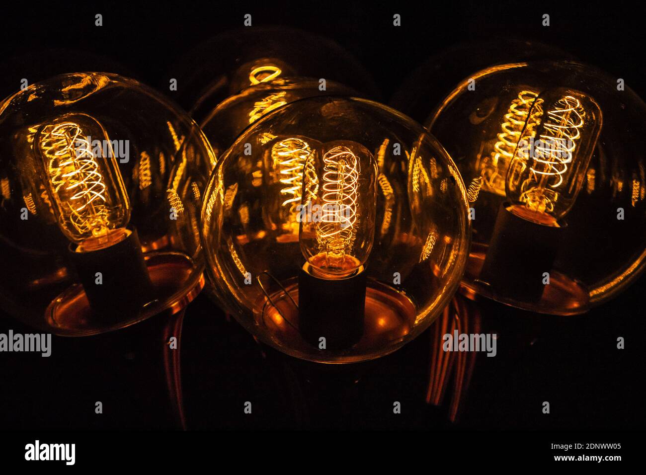 Abstract scene produced by light filaments inside glass bulbs Stock Photo