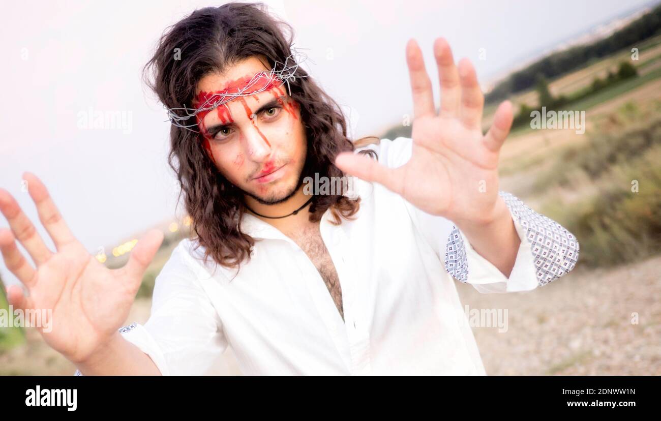 Man with crown of thorns hi-res stock photography and images - Alamy