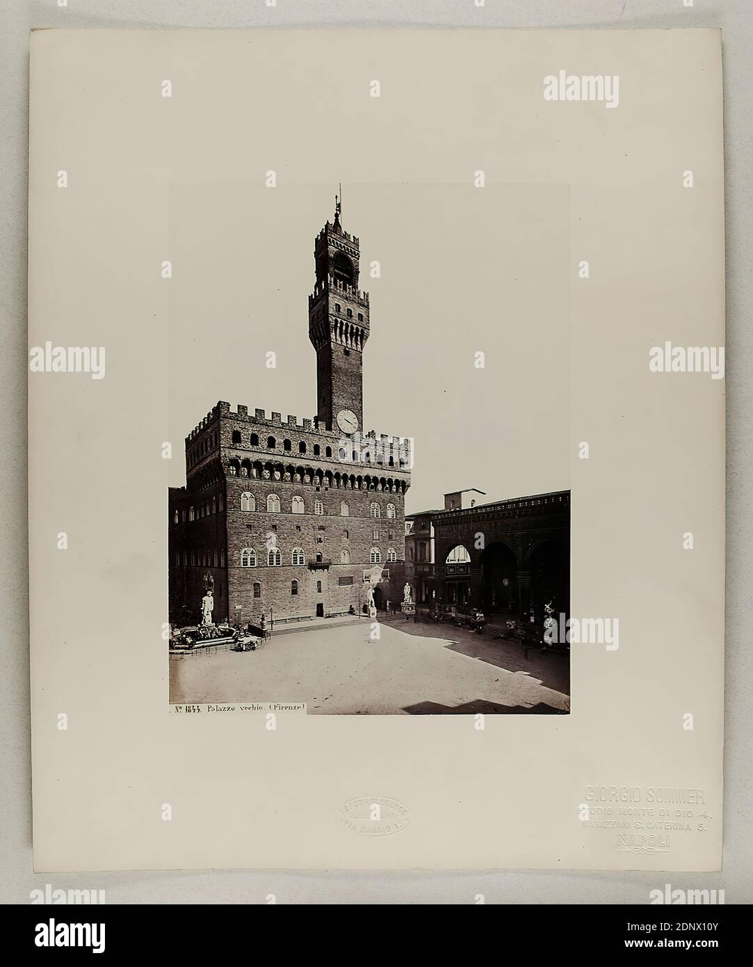 Giorgio Sommer, Palazzo Vecchio (Firenze), albumin paper, black and white positive process, sheet size: height: 24.00 cm; width: 18.00 cm, inscribed: recto and: exposed No. 1844, Palazzo Vecchio (Firenze), dry stamp: recto and on the cardboard: GIORGIO SOMMER, STUDIO MONTE DI DIO 4, MAGAZZINO S. CATERINA 5, NAPOLI, and J. BRECKER, DEPOT A FLORENCE, VIA MAGGIO 15, stamp: on the back of the cardboard: inventory, travel photography, architectural photography, hist. building, locality, street, city hall Stock Photo