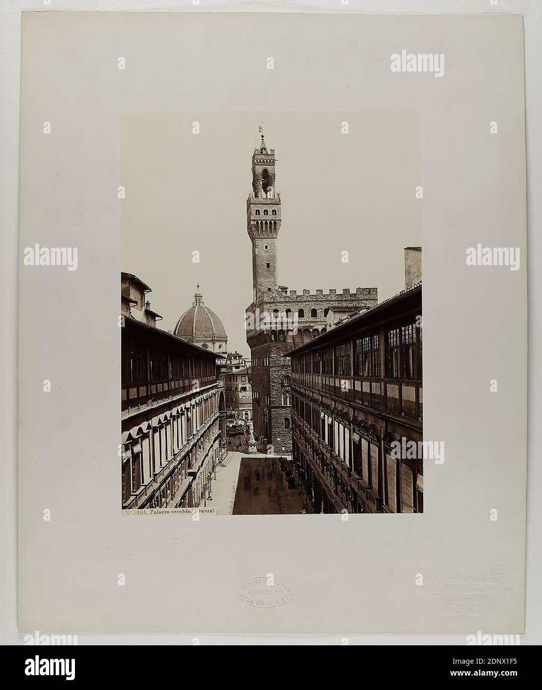 Giorgio Sommer, Palazzo Vecchio (Firenze), albumin paper, black and white positive process, sheet size: height: 24.30 cm; width: 18.00 cm, inscribed: recto and: exposed No. 3804 Palazzo Vecchio (Firenze), dry stamp: recto and on the cardboard: GIORGIO SOMMER, STUDIO MONTE DI DIO 4, MAGAZZINO S. CATERINA 5, NAPOLI, as well as J. BRECKER, DEPOT A FLORENCE, VIA MAGGIO 15, stamp: on the back of the cardboard: inventory, travel photography, architectural photography, hist. building, locality, street, city hall Stock Photo