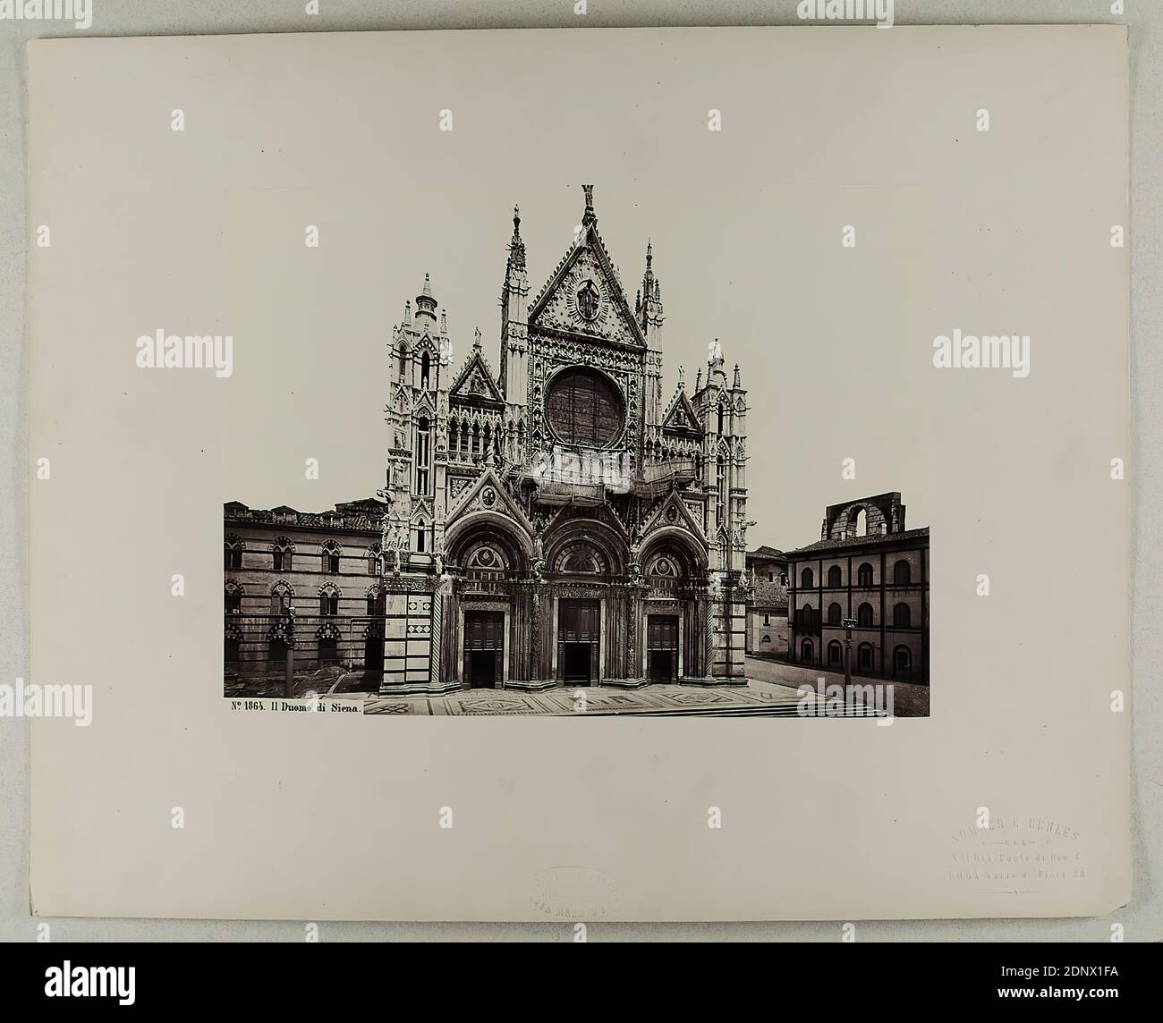 Giorgio Sommer, Il Duomo di Siena, albumin paper, black and white positive process, sheet size: height: 18.20 cm; width: 24.40 cm, inscribed: recto and: exposed: No. 1864 Il Duomo di Siena, dry stamp: recto and on the cardboard: GIORGIO SOMMER, STUDIO MONTE DI DIO 4, MAGAZZINO S. CATERINA 5, NAPOLI, and J. BRECKER, DEPOT A FLORENCE, VIA MAGGIO 15, stamp: on the verso of the cardboard: inventory, travel photography, architectural photography, exterior construction of a church Stock Photo