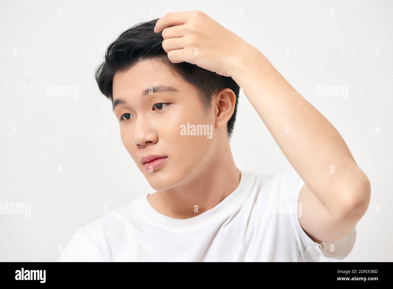 Portrait of healthy man combing his hair with fingers Stock Photo Alamy