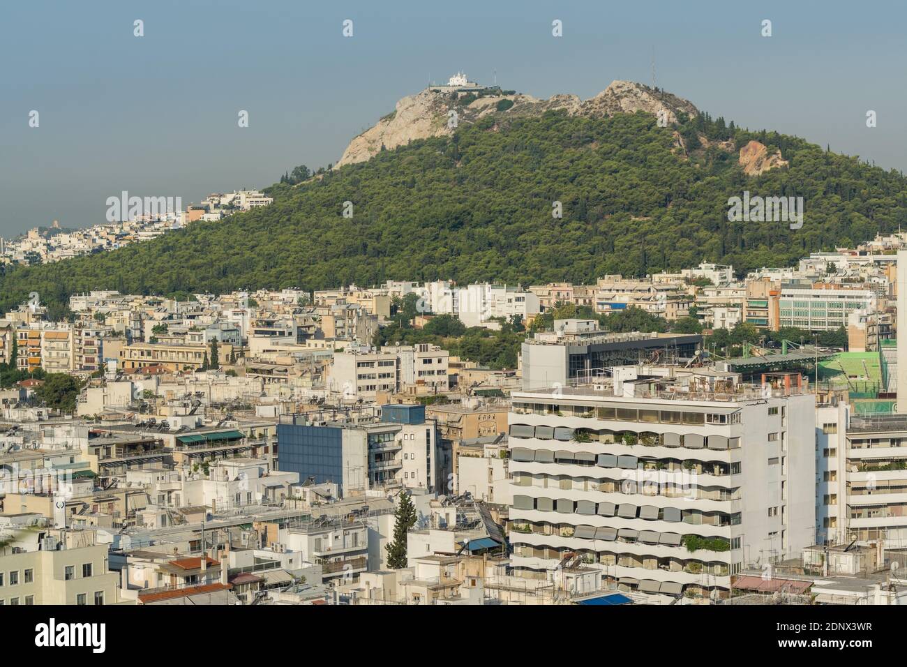 Aerial view of cityscape with crowded buildings of Athens from a top of hotel in a sunny day in Greece Stock Photo