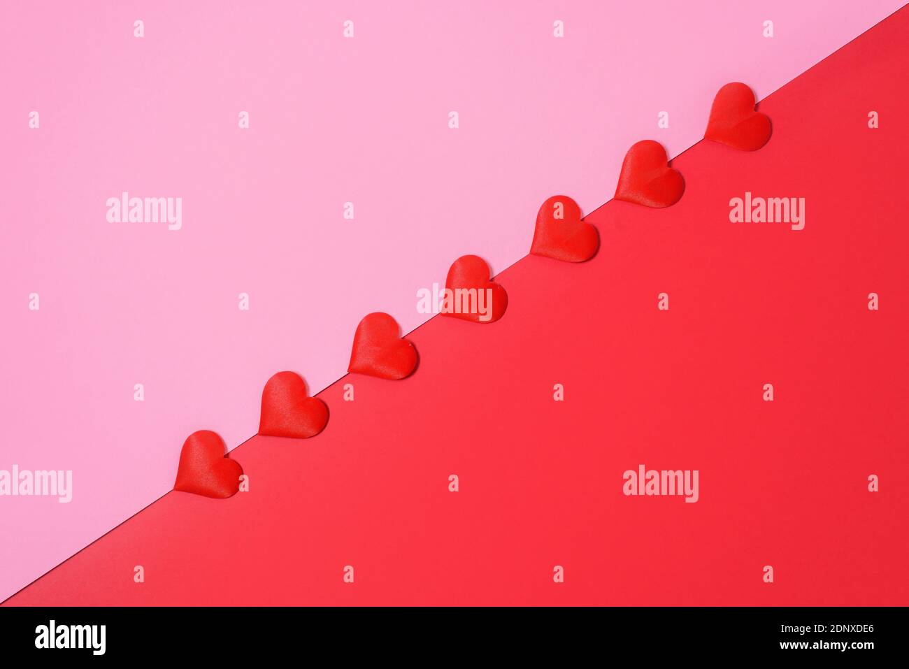 valentine's day greeting card layout with red hearts on pink and red ...
