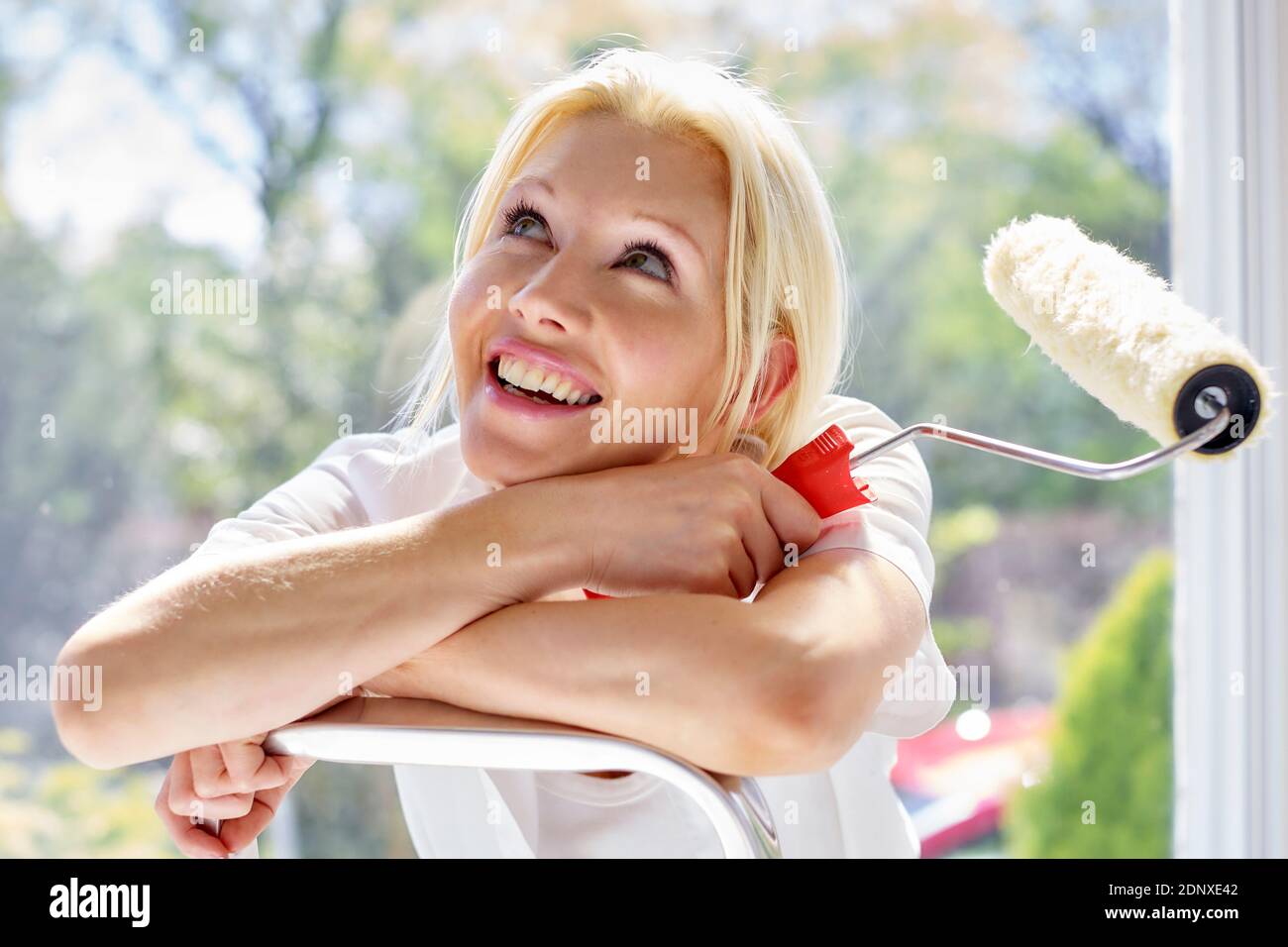 Attractive woman decorating Stock Photo
