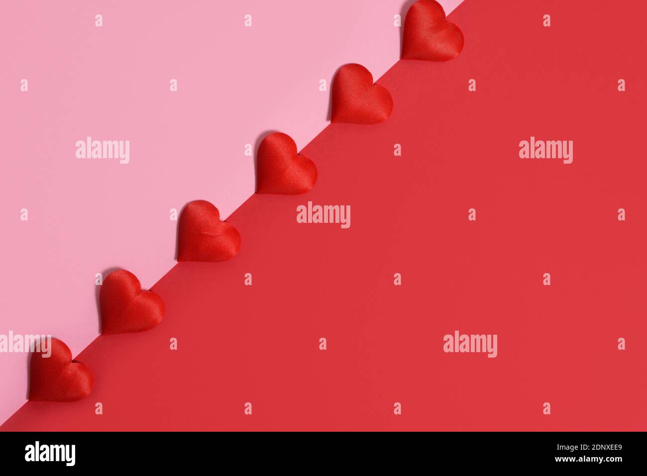 valentine's day greeting card layout with red hearts on pink and red ...