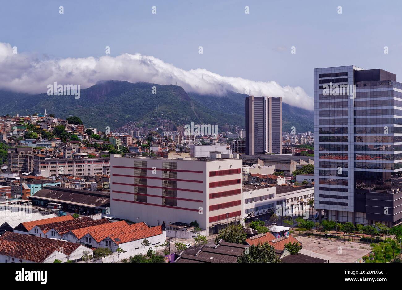 Some of the traditional and modern buildings within the Old Port Area of Rio de Janeiro with the dramatic mountains in the background, Stock Photo