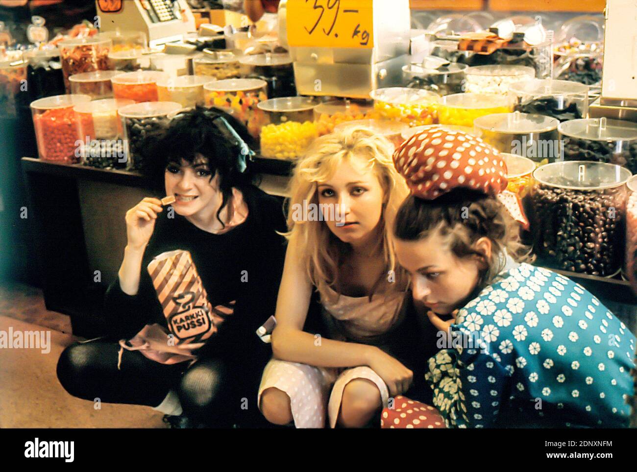 THE SLITS 1980 (Finland) in a sweetshop. Tessa Pollitt, Ari-up and Viv Albertine after releasing 'In the Beginning there was rhythm' on Y records. Stock Photo