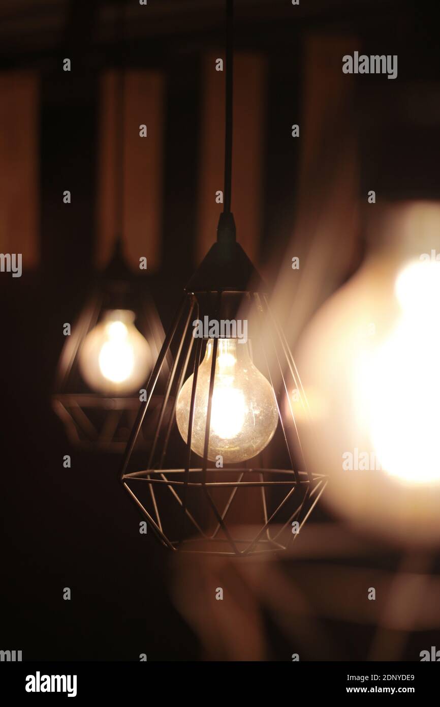 Light Bulb Hanging From Ceiling High Resolution Stock Photography and