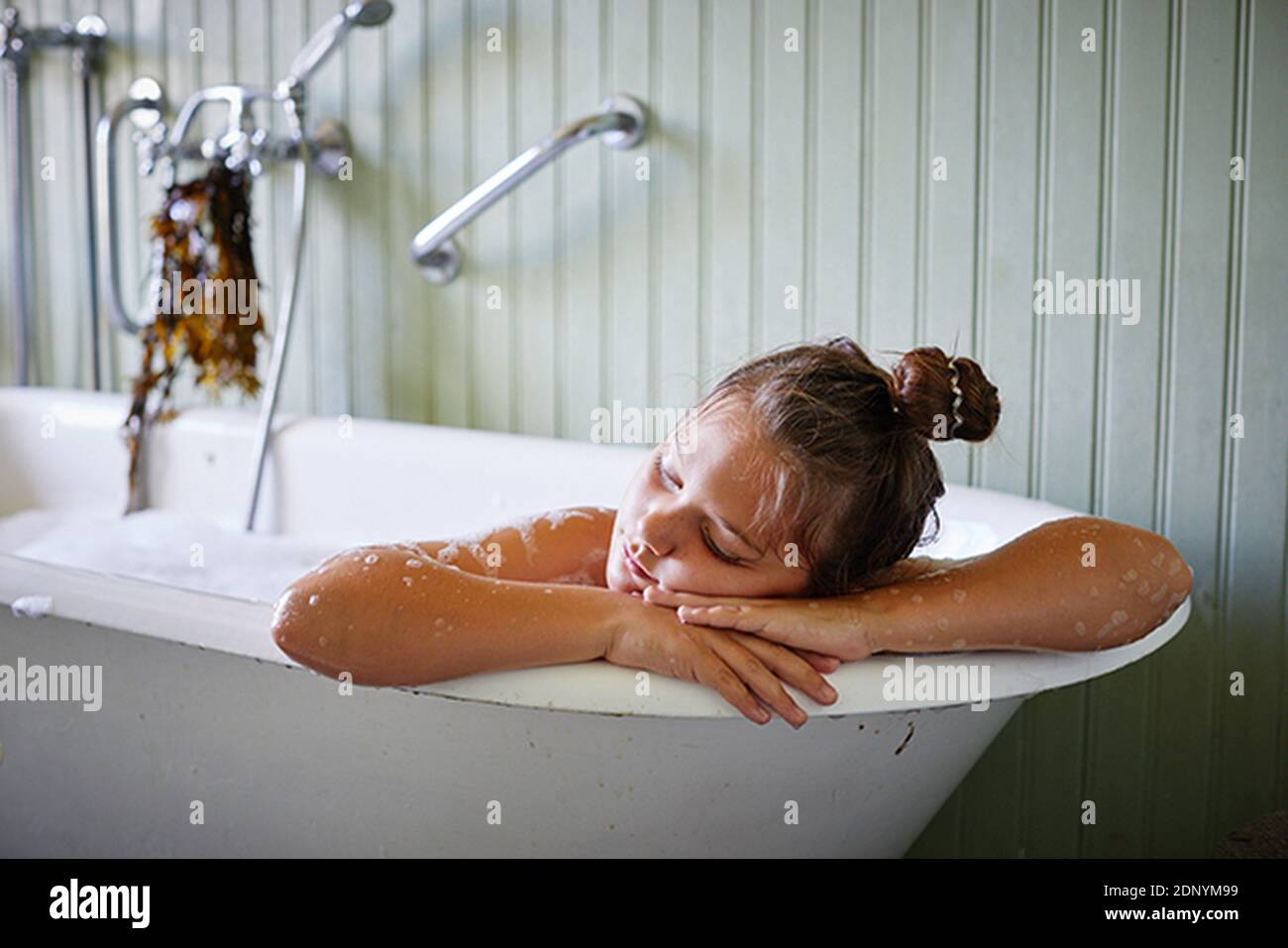 Girl relaxing in bathtub Stock Photo Alamy