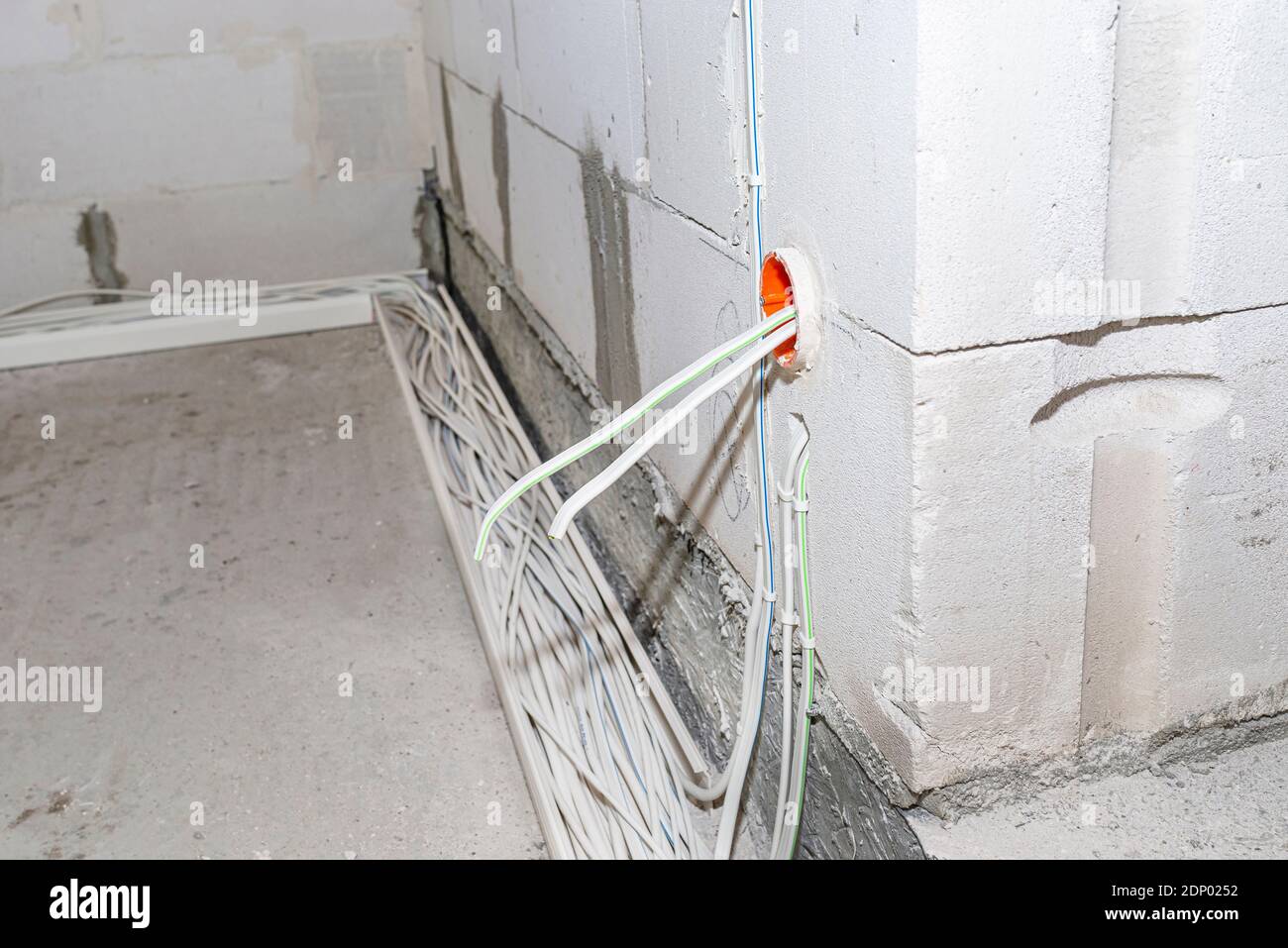 Layed Installation Of Electric Cables On The Floor In A Newly Built