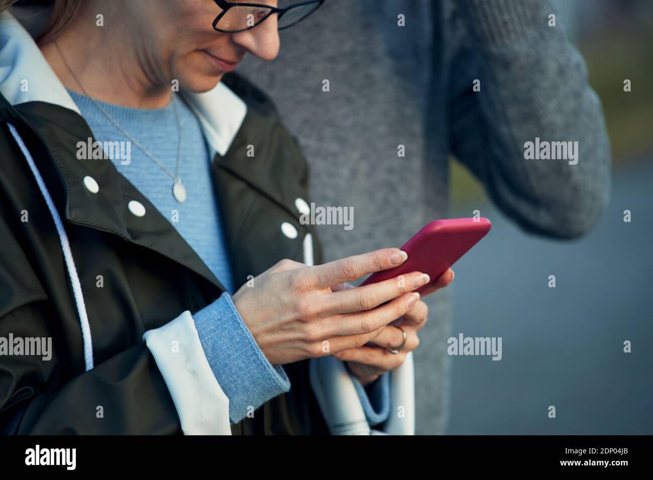 Woman checking cell phone Stock Photo