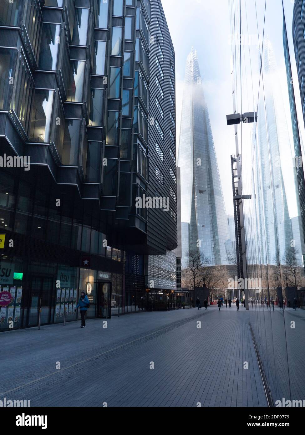 fog, mist in London with the Shard, seen from More  London, London Bridge City, London Stock Photo