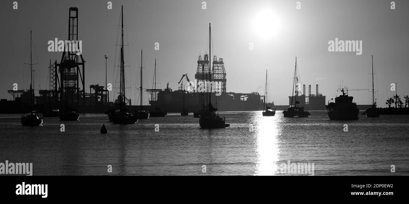 Sailboats anchored on bay Black and White Stock Photos & Images - Alamy