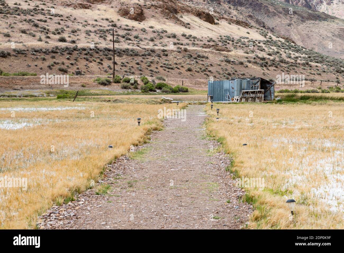 Walking path and metal soaking shelter at Alvord Hot Springs.  Harney County, Oregon Stock Photo