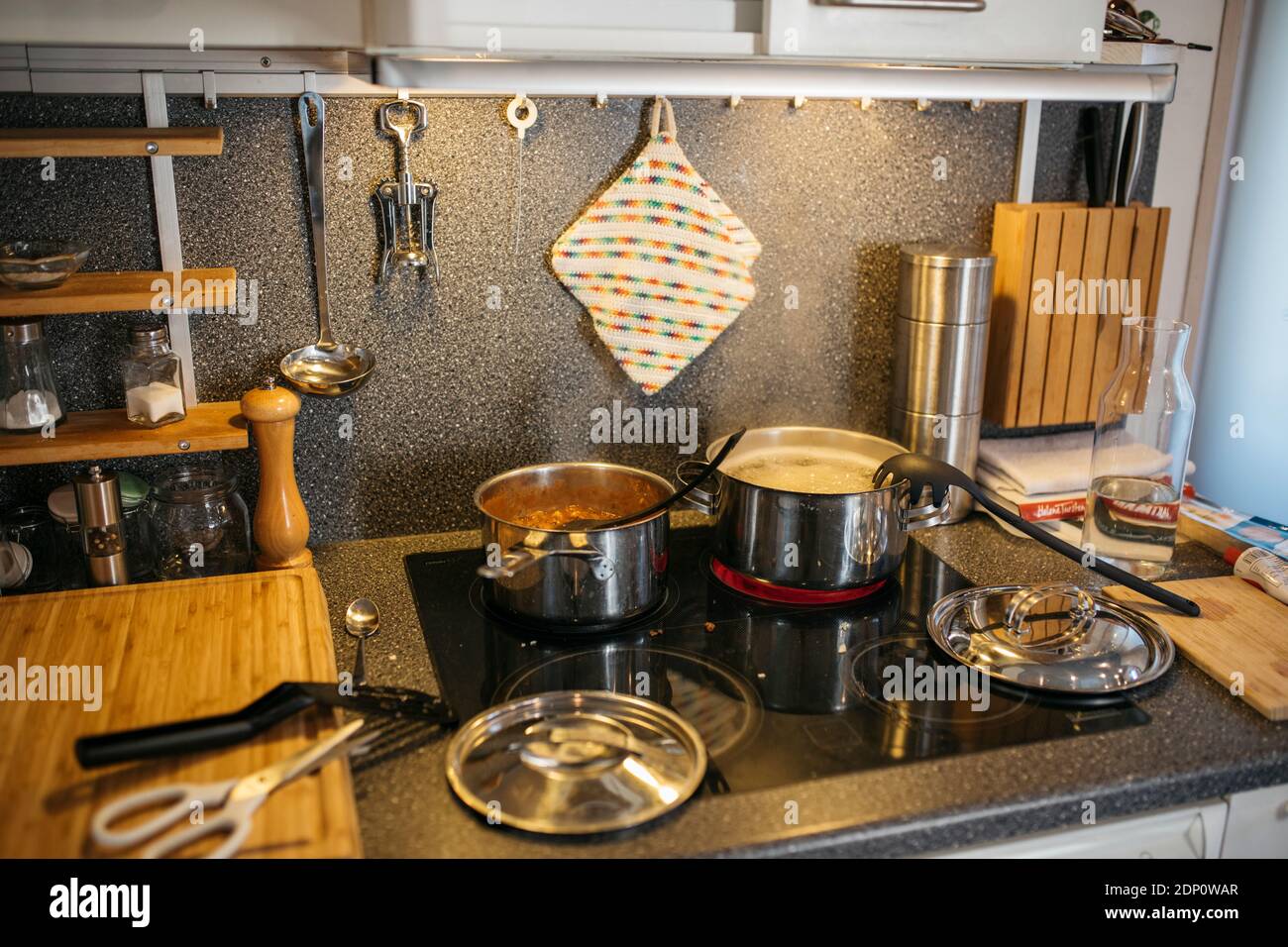 Food in pots cooking on stove Stock Photo Alamy