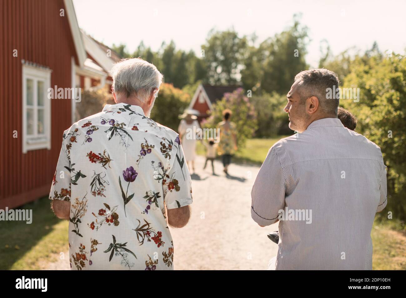 Rear view of men hi-res stock photography and images - Alamy