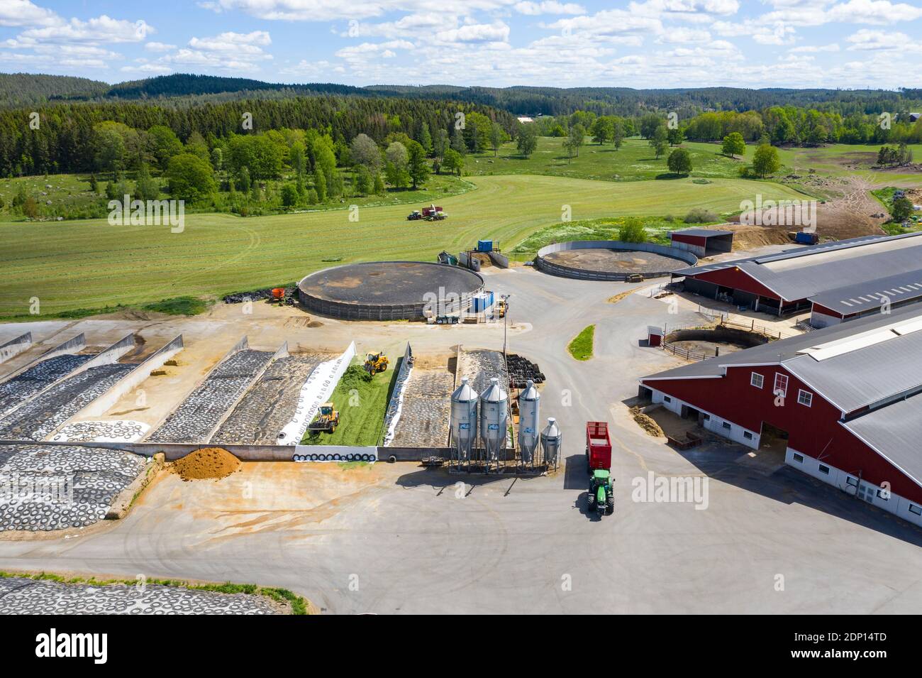 View of silage pit and agricultural buildings Stock Photo