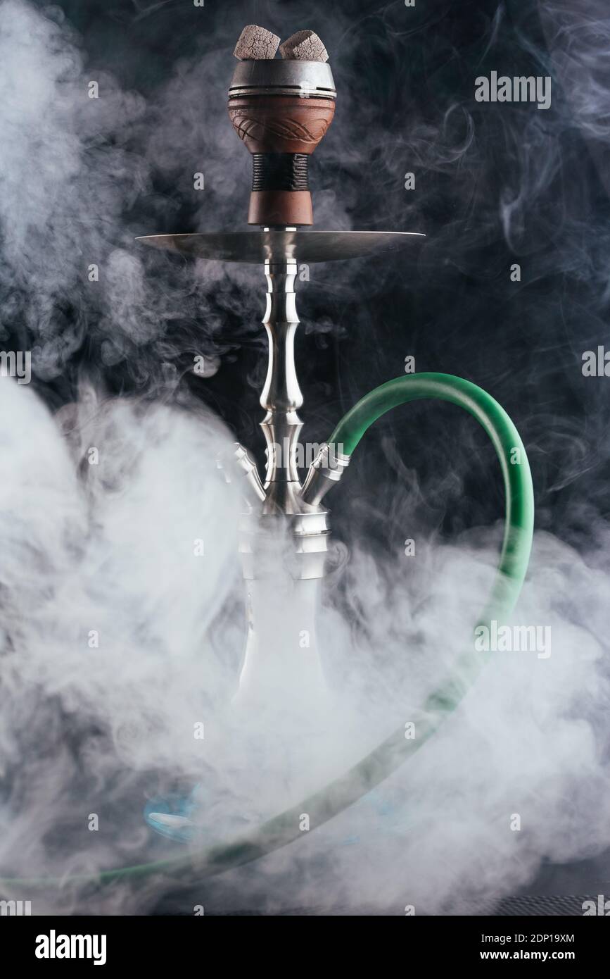hookah on a black background with smoke Stock Photo