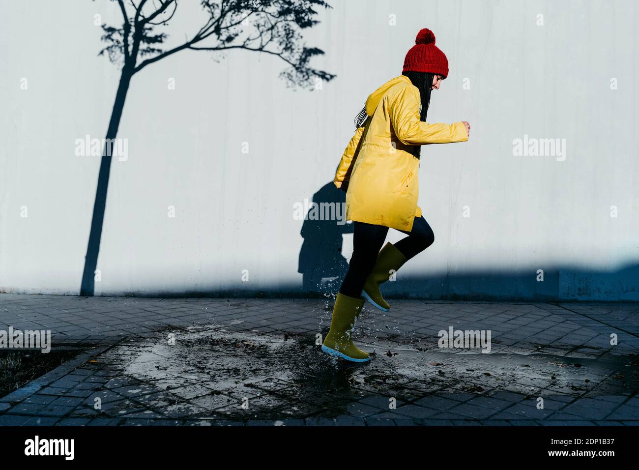 Women wearing raincoats hires stock photography and images Alamy