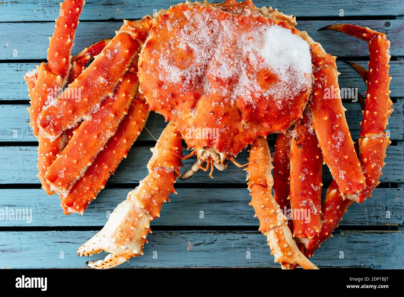 large frozen crab on a Board Stock Photo