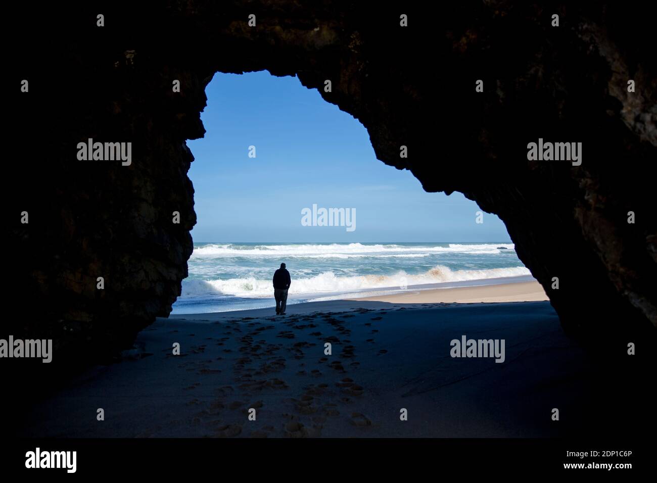 Silhouette of person at sea Stock Photo