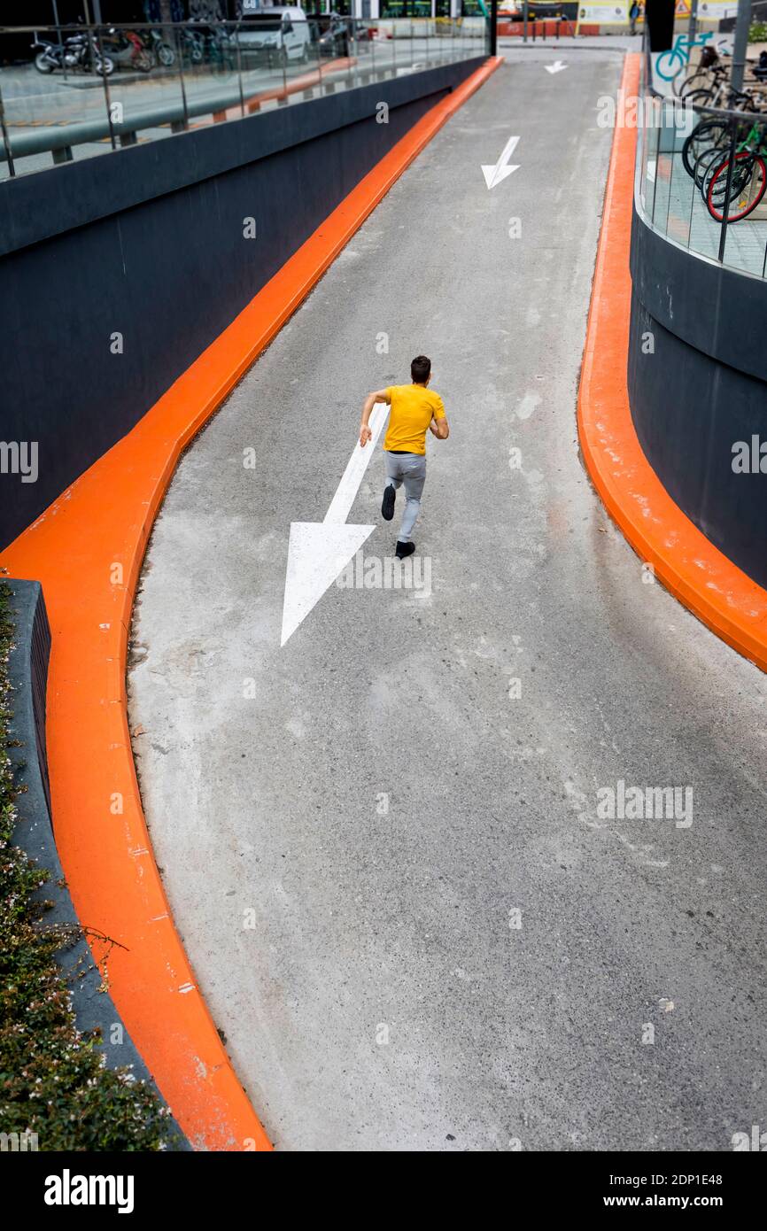 Young man jogging outdoor Stock Photo