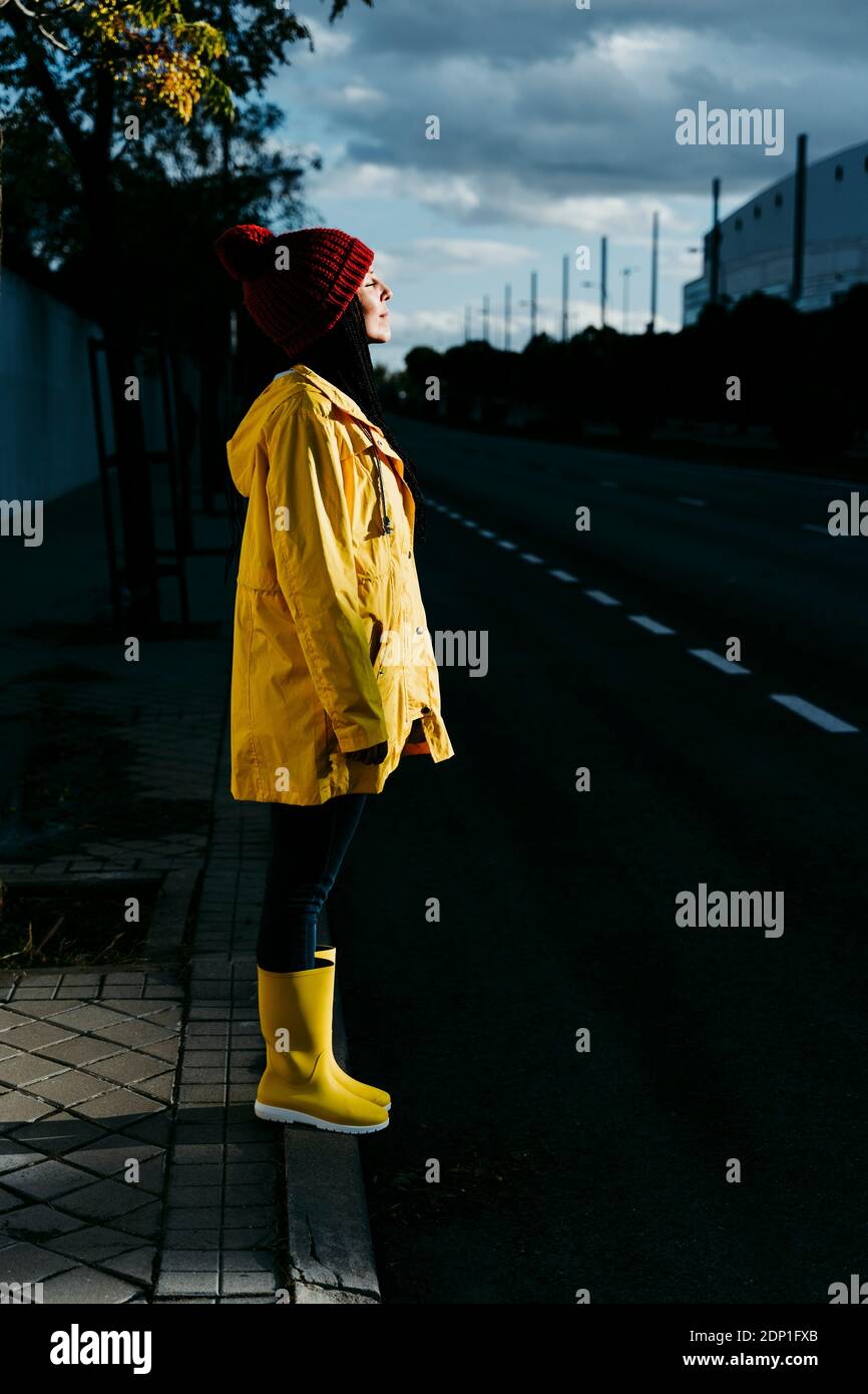 Women wearing raincoats hi-res stock 