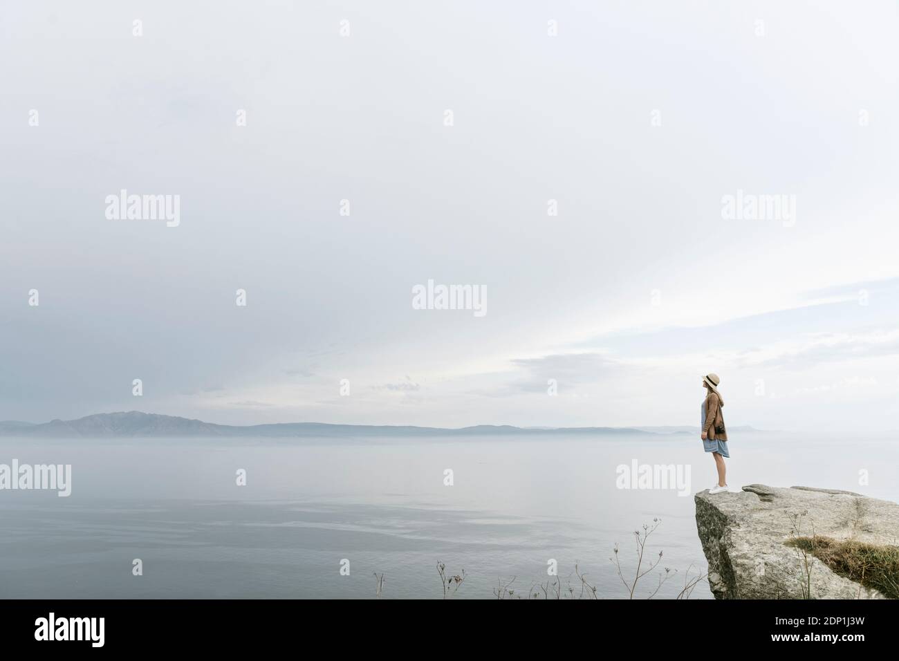 Person standing in the sea hi-res stock photography and images - Alamy