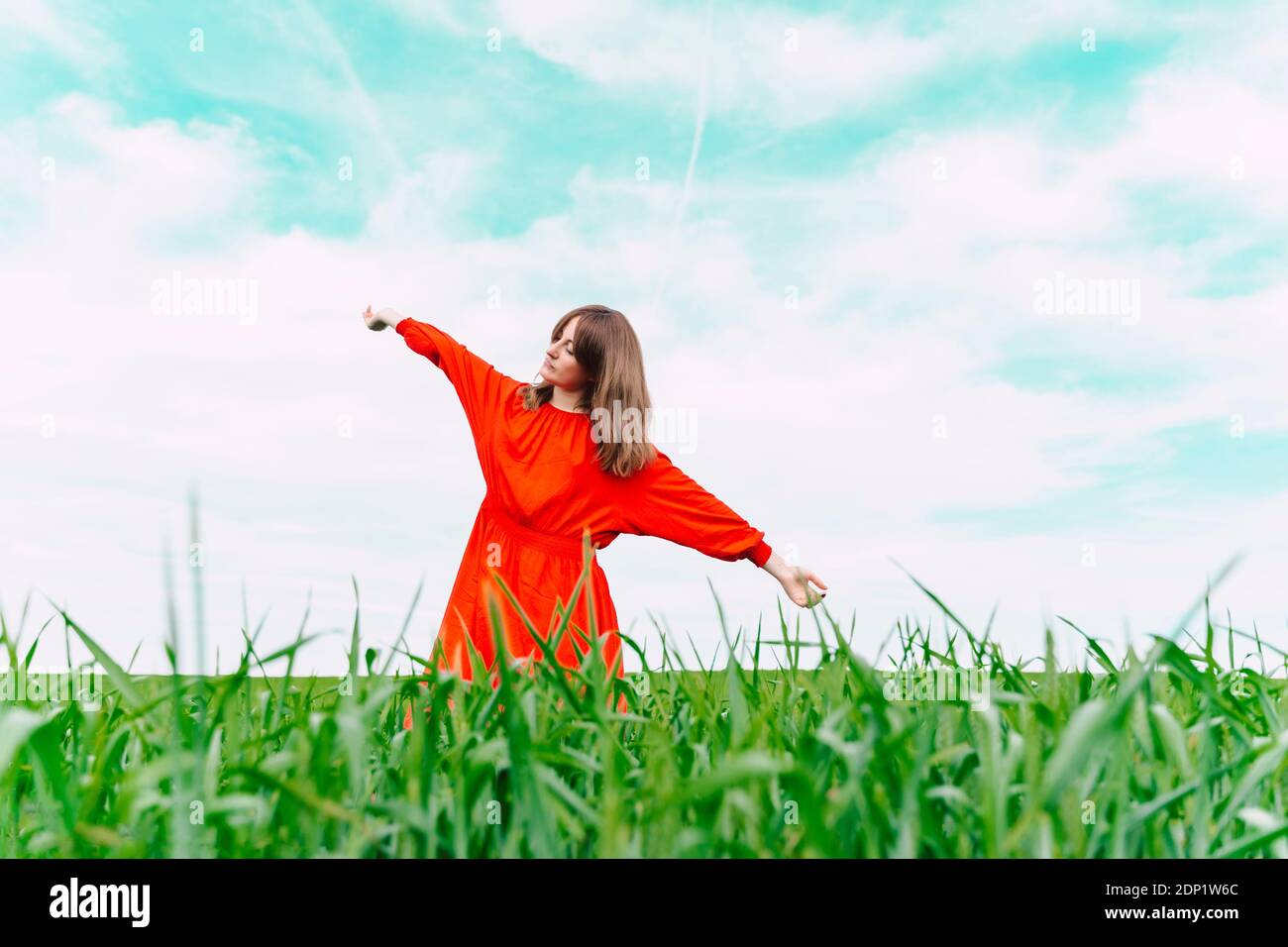 Woman dancing with long dress hi-res stock photography and images - Alamy