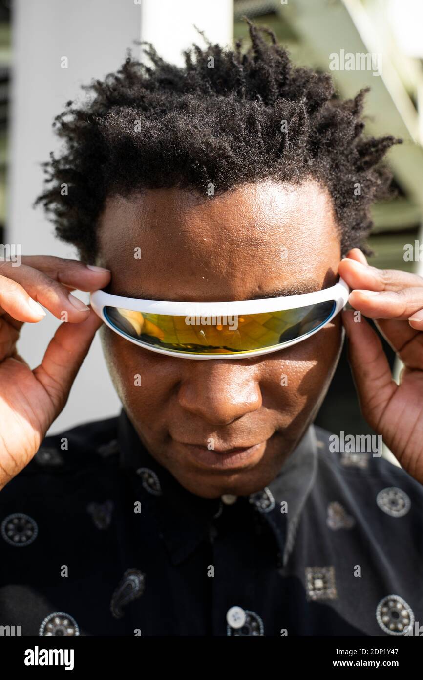 Portrait of man wearing mirrored sunglasses Stock Photo - Alamy